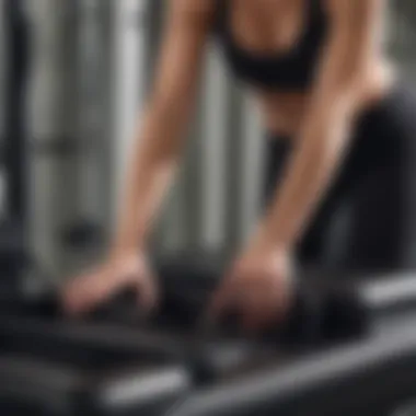 Close-up of a person performing precise Pilates movements on AeroPilates machine