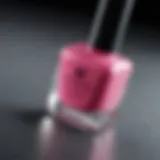 A close-up view of vibrant anti-stain nail polish on a pristine surface