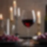 Elegant wine glass with red wine on a sophisticated table setting