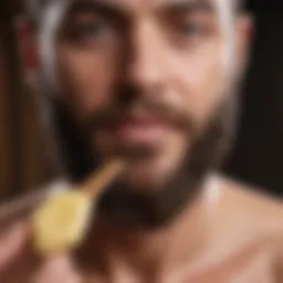 A close-up view of beard butter melting on a wooden spoon