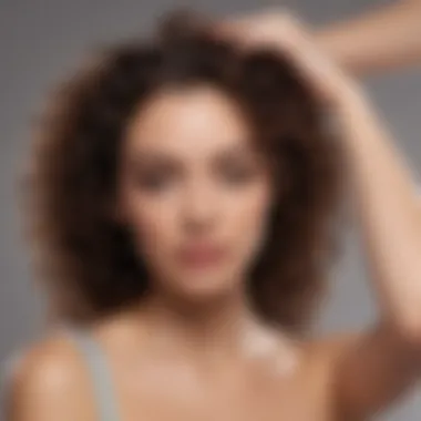 Woman applying leave-in detangler to enhance curl definition