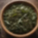 A close-up of herbal tea leaves in a wooden bowl