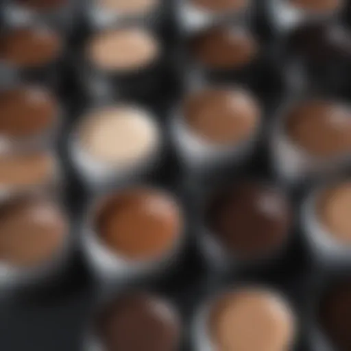 Close-up of eyebrow pomade containers in a variety of shades