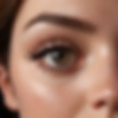 Artful Hourglass Eyeliner Close-Up A close-up of an eye showcasing hourglass eyeliner application with striking curves