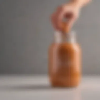 Glass jar filled with homemade self-tanner lotion