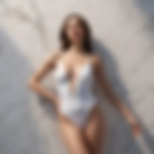 Luxurious swimsuit on marble background