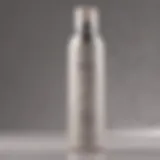 A close-up view of Nexxus Dry Shampoo bottle showcasing its sleek design.