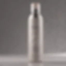 A close-up view of Nexxus Dry Shampoo bottle showcasing its sleek design.