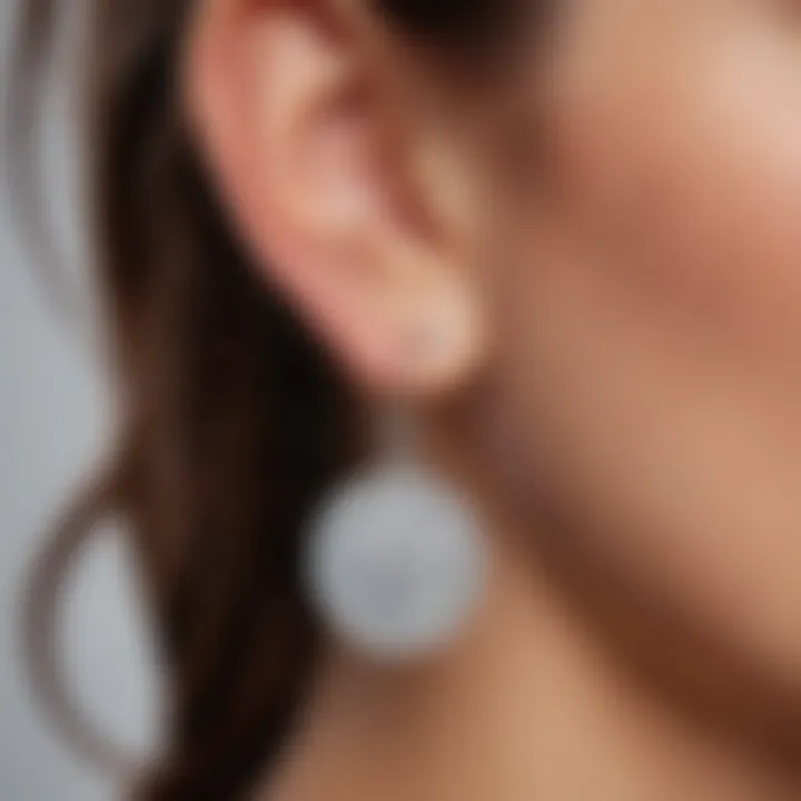 Close-up of hypoallergenic earrings with certification stamp