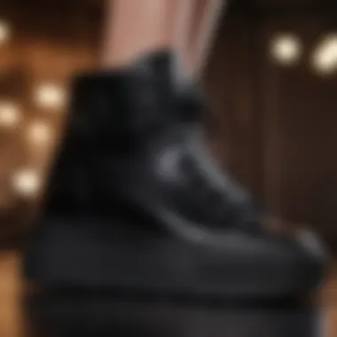 Elegance in Motion A pair of black platform high top sneakers with metallic accents