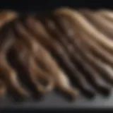 Variety of clip-in hair extensions displayed on a table