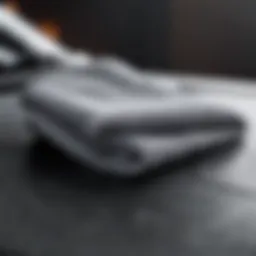 Soft microfiber drying towel on a polished car surface