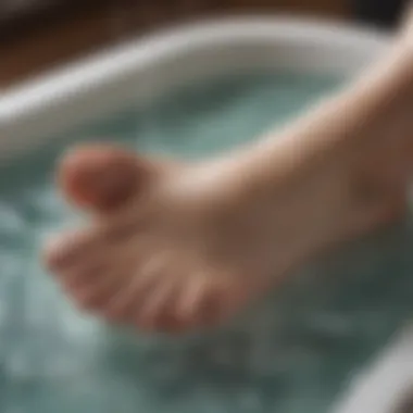 Close-up of a foot soaking in warm water with essential oils