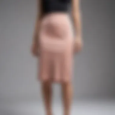 The Elegance of the Midi Slip Skirt Elegant petite midi slip skirt on a mannequin showcasing its silhouette.