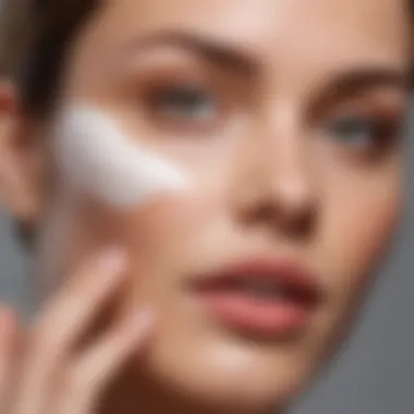 Close-up of tinted mineral SPF 50 cream being applied on the skin