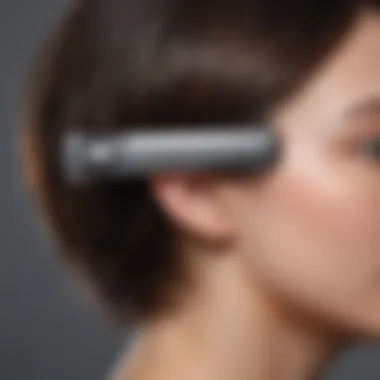 Close-up of a Dyson hair clip showcasing its innovative design